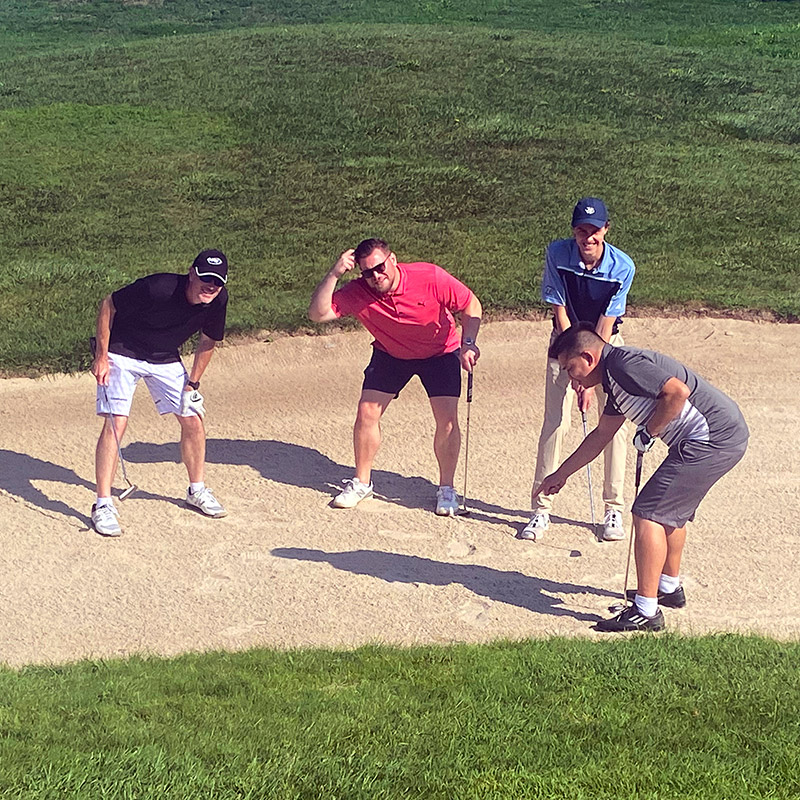 Foursome in the sand.